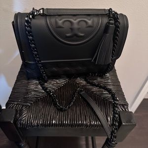 Tory Burch black purse, used three times. Beautiful beautiful beautiful!